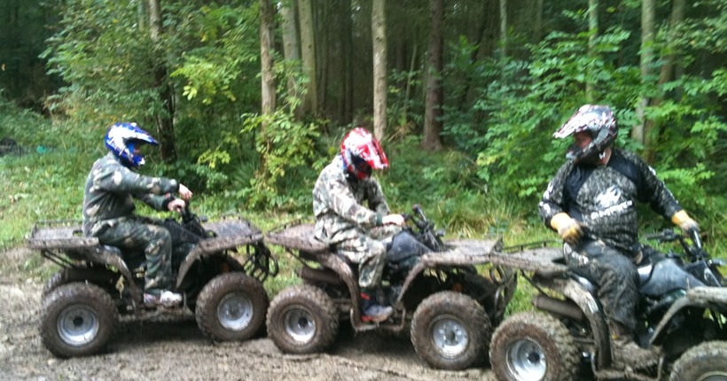 3 quad bikers